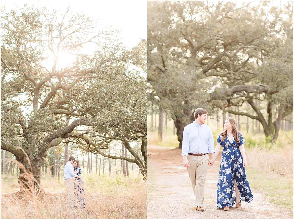 man and woman standing under giant oak tree in the longleaf pine forest