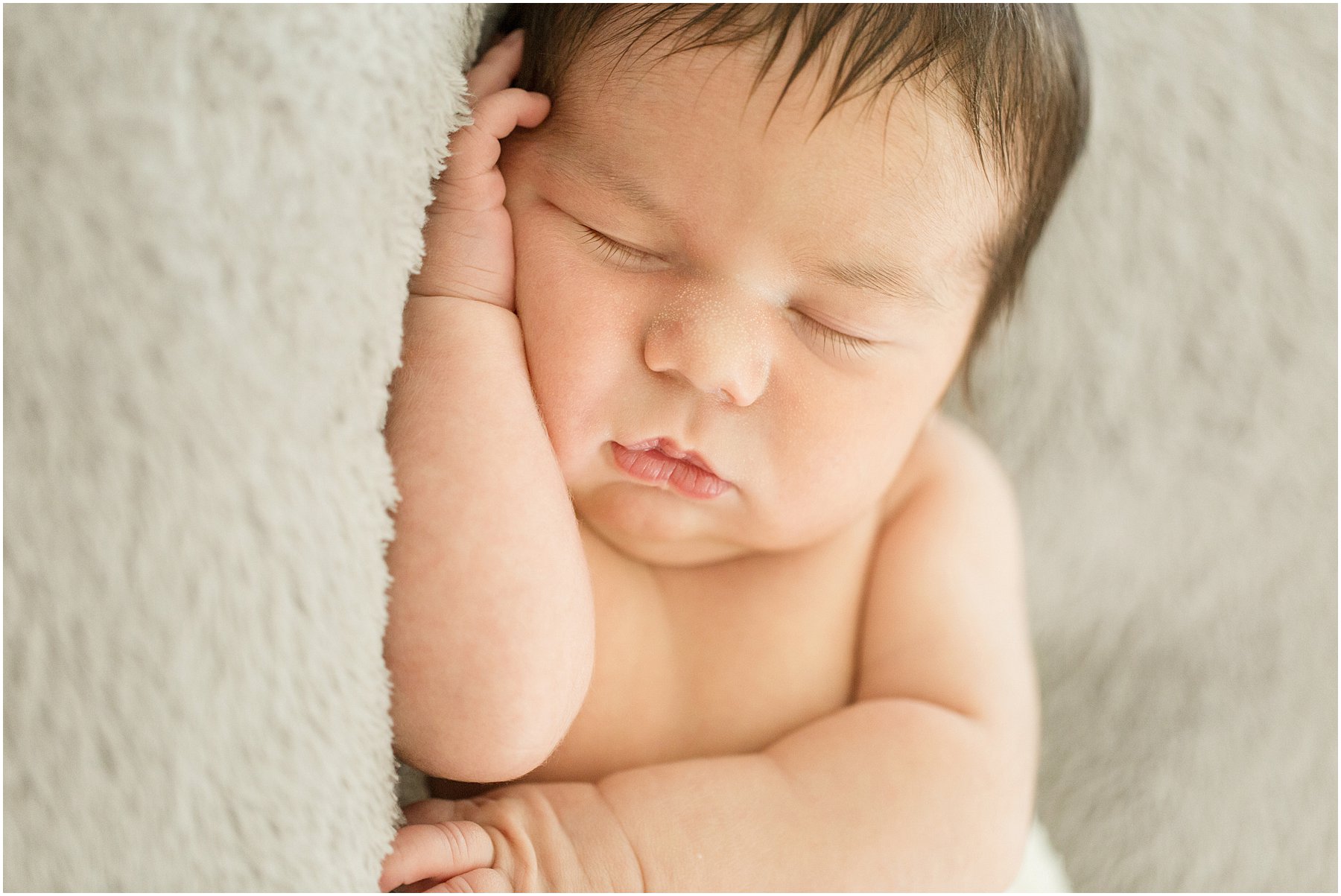 Close up photo of sleeping newborn face